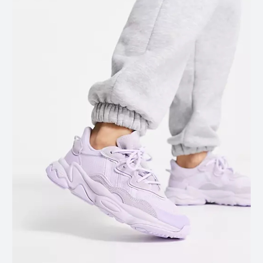 Adidas Ozweego purple tint sneakers.